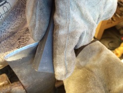 Honing with the oilstone.