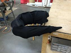 Tail folded with fabric.