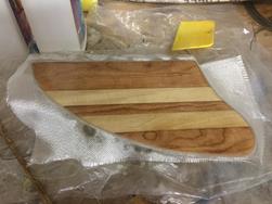 Fiberglassing fins.