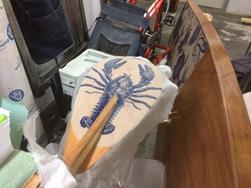 Fiberglassing paddle.